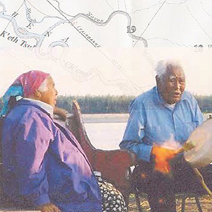 Two Alaska native people sitting